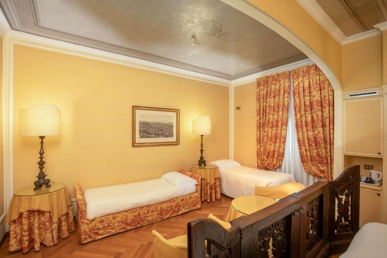Standard Family Room One Queen Bed Two Single Beds Non-Smoking,1352664238:JPEG